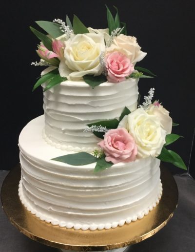 Christine's Cakes & Pastries - 2 Tier-Buttercream Wedding Cake with ribbon texture