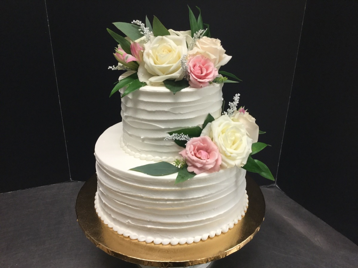 Christine's Cakes & Pastries - 2 Tier-Buttercream Wedding Cake with ribbon texture