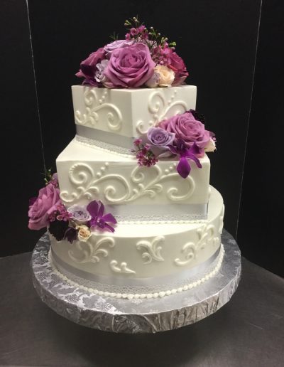 Christine's Cakes & Pastries - 3 Tier-Buttercream hand piped scroll work (Fresh Flower Accent)-square _circle