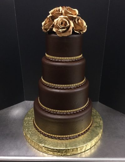 Christine's Cakes & Pastries - 4 Tier-Poured Chocolate Wedding Cake with gold rhinestones (Fake Flower Accent)