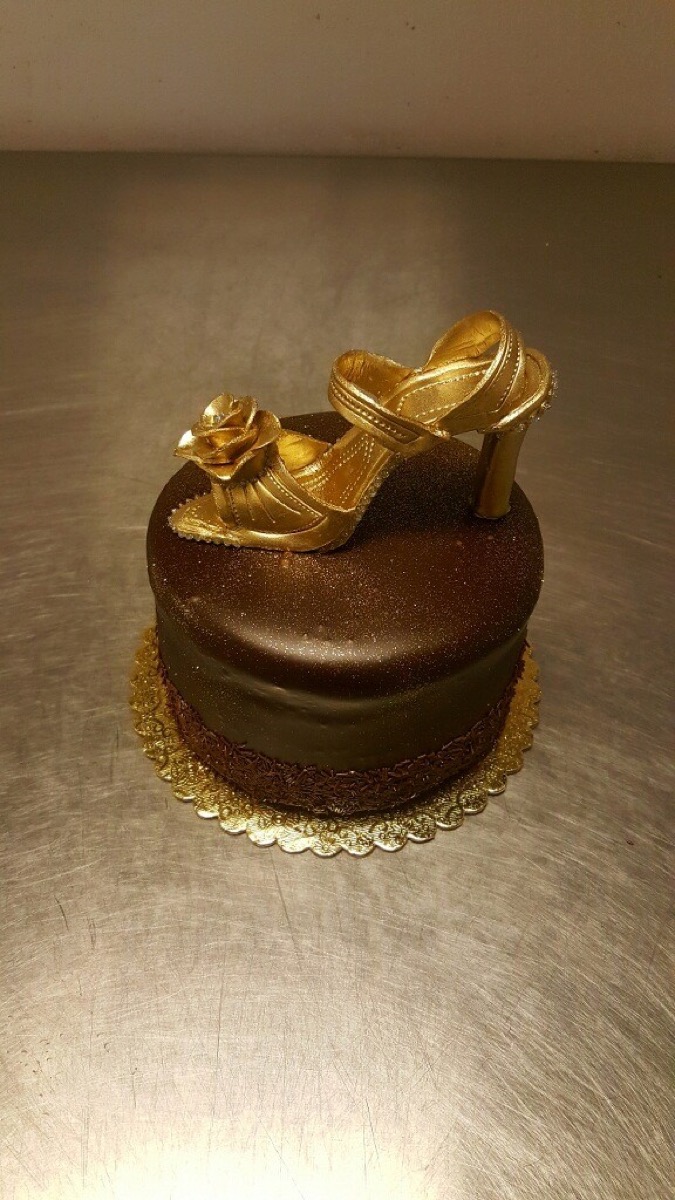 Christine's Cakes & Pastries - High heel on poured chocolate cake